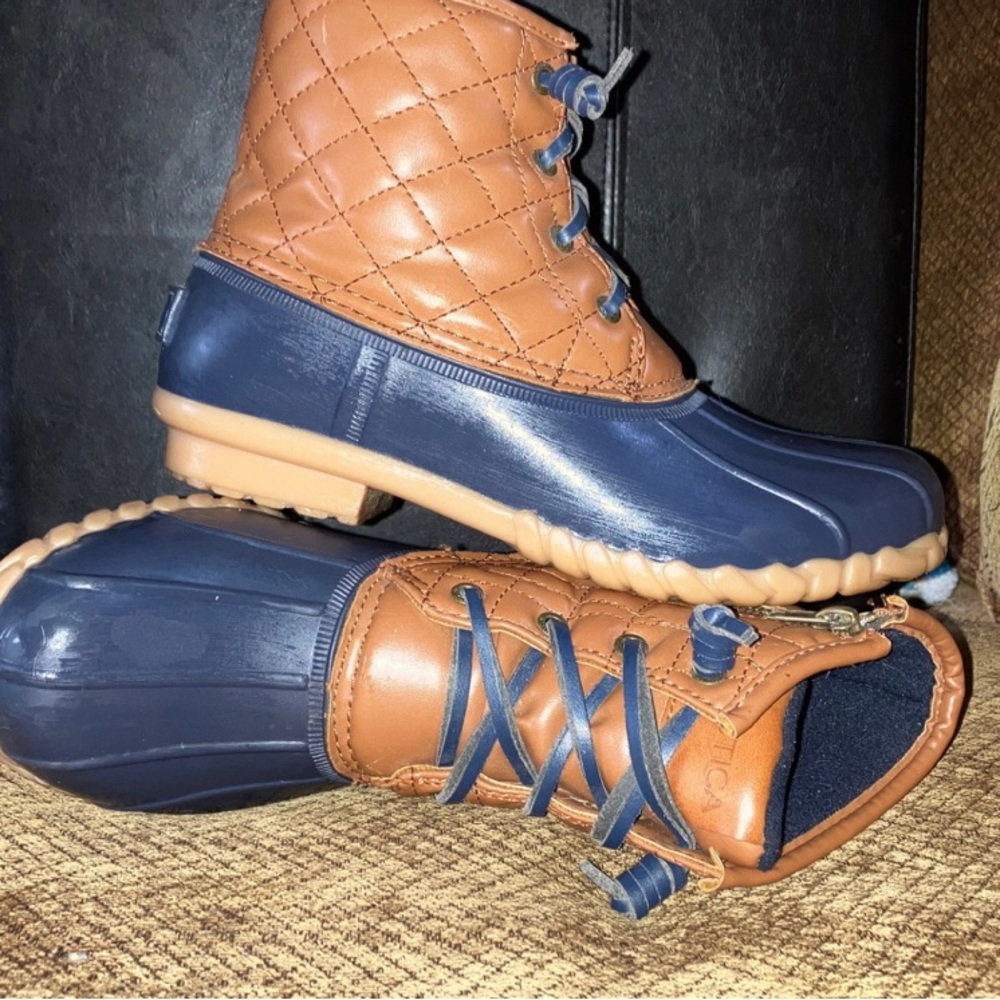 Brown and Blue size 7 women’s Nautica boots.